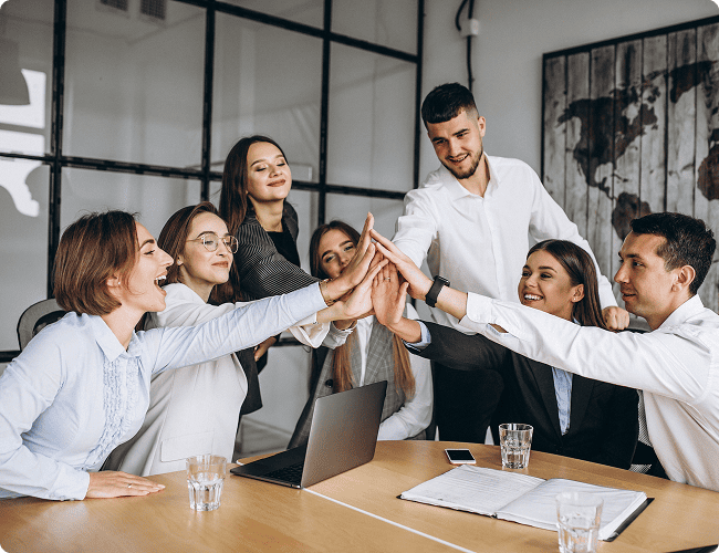 Team hands stacked in unity